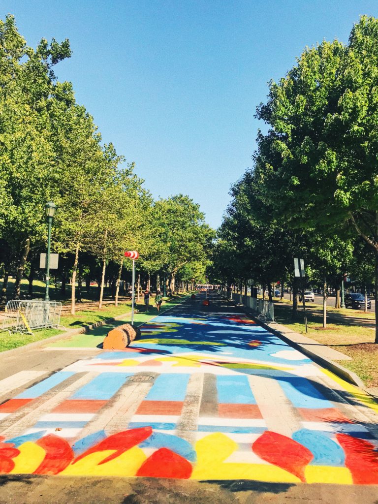 Colorful street mural at The Oval+