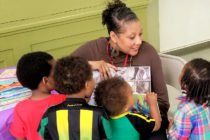 Early Childhood Education Specialist Dawn Nock (from PEC’s BELL project) reading to children